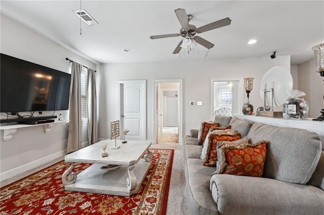 living room with recessed lighting, a ceiling fan, visible vents, baseboards, and carpet