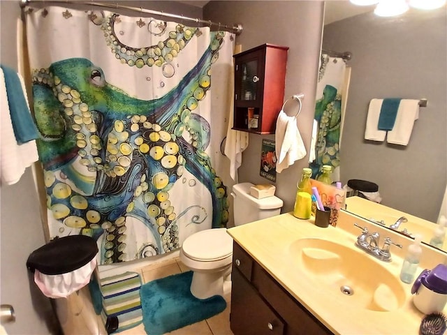 full bath featuring toilet, curtained shower, vanity, and tile patterned floors