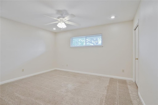 unfurnished room with baseboards, ceiling fan, recessed lighting, and light colored carpet