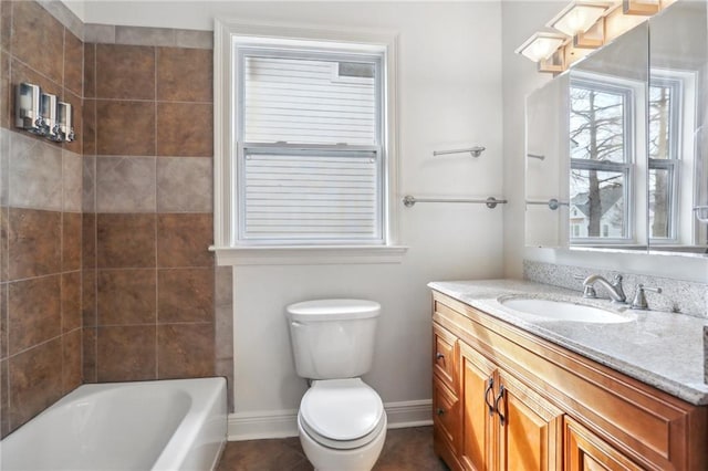 full bathroom featuring  shower combination, baseboards, vanity, and toilet