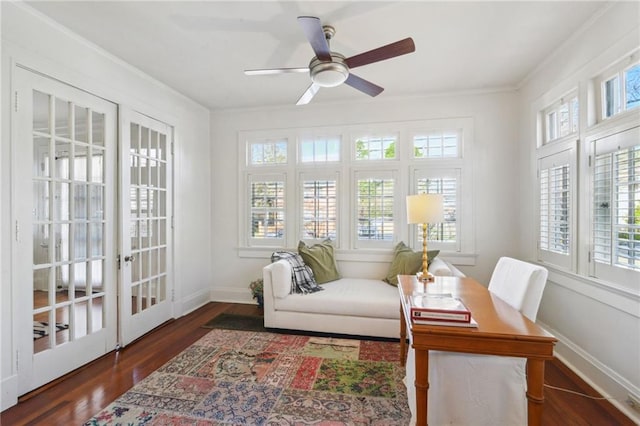 sunroom featuring french doors and a ceiling fan