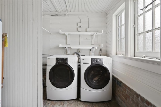 laundry area with laundry area and independent washer and dryer