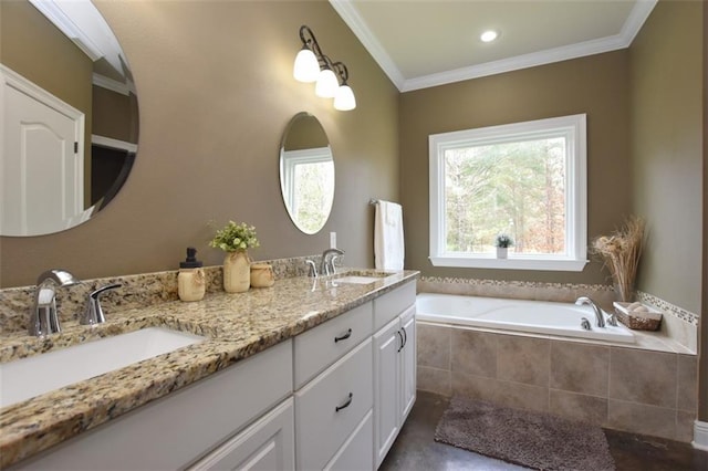 bathroom with ornamental molding, double vanity, a sink, and a bath