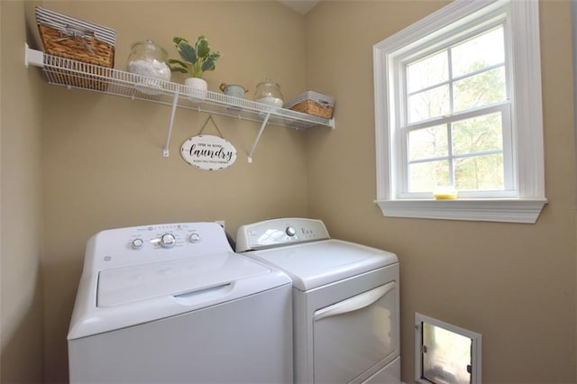 washroom with laundry area and washer and clothes dryer