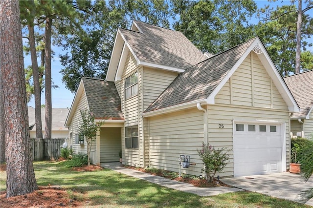 view of front of home featuring a garage, concrete driveway, roof with shingles, and fence