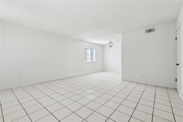 spare room featuring visible vents