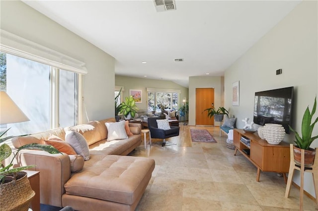 living room with recessed lighting and visible vents