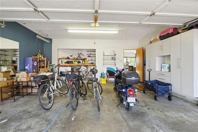 garage with a workshop area