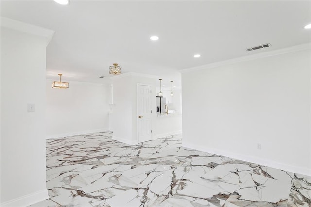 empty room with ornamental molding, recessed lighting, visible vents, and baseboards