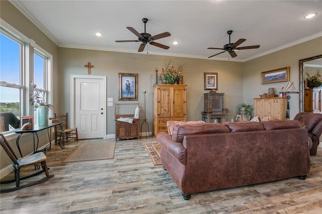 278 Lakeview Dr, Slidell, LA 70458 - living area featuring baseboards, ornamental molding, and wood finished floors