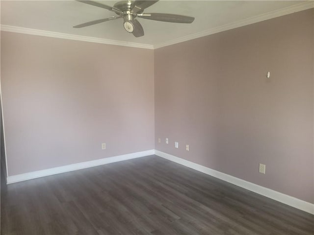 unfurnished room with ornamental molding, dark wood finished floors, baseboards, and a ceiling fan