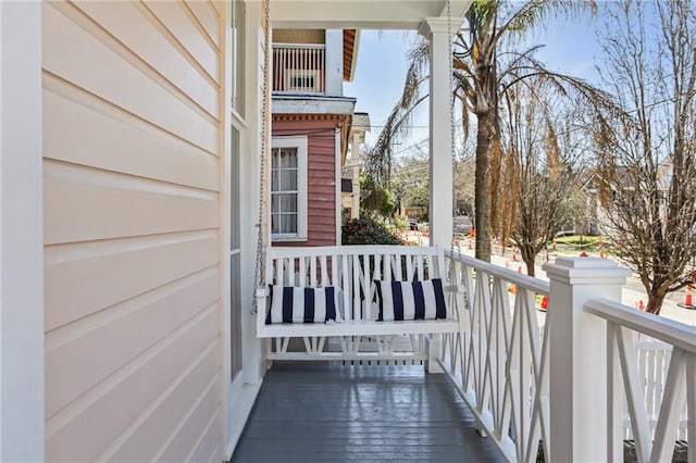 balcony featuring covered porch