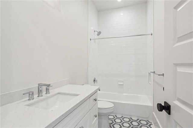 bathroom with toilet, washtub / shower combination, and vanity