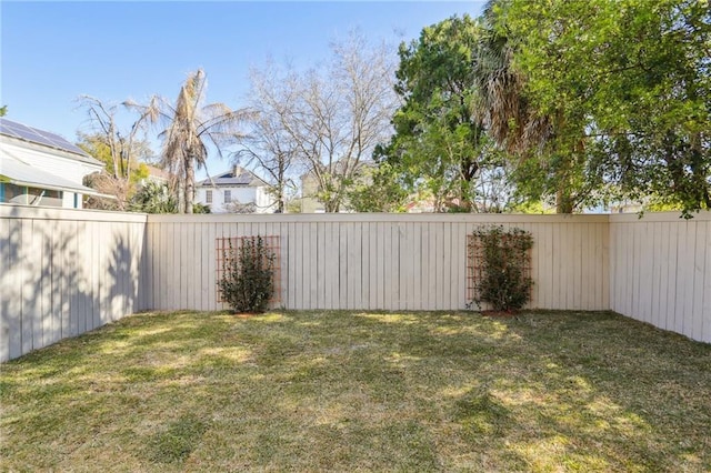 view of yard featuring a fenced backyard