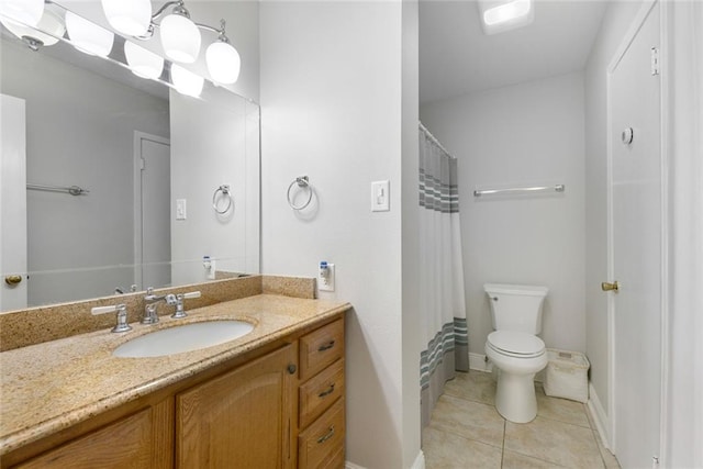 full bathroom featuring tile patterned flooring, toilet, a shower with shower curtain, vanity, and baseboards