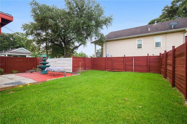 view of yard featuring a fenced backyard