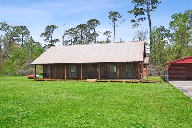 16685 Meissner Rd, Springfield, LA 70462 - view of front facade with a front lawn