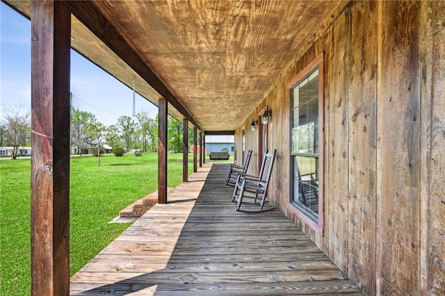 16685 Meissner Rd, Springfield, LA 70462 - wooden deck featuring a yard