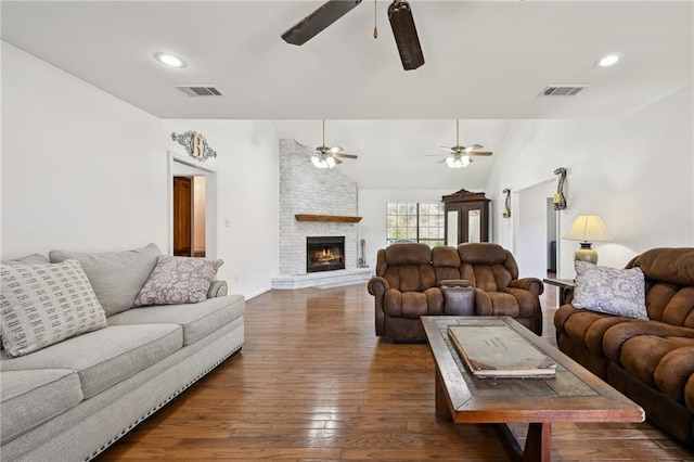 16685 Meissner Rd, Springfield, LA 70462 - living room with visible vents, lofted ceiling, dark wood-type flooring, and a ceiling fan