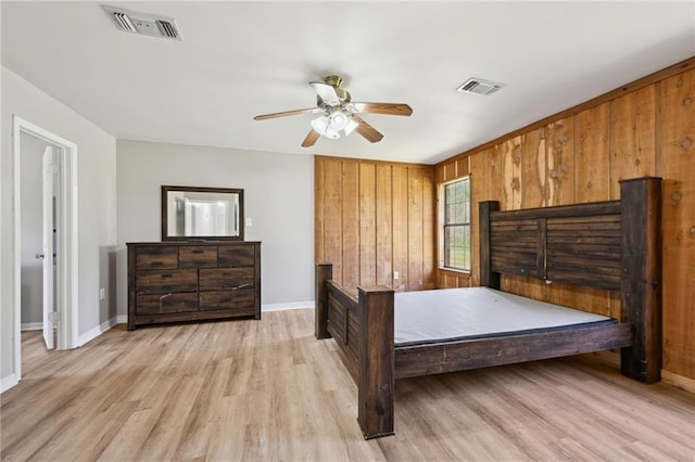 16685 Meissner Rd, Springfield, LA 70462 - bedroom featuring baseboards, visible vents, and light wood-style floors