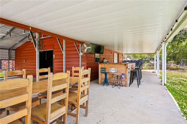 16685 Meissner Rd, Springfield, LA 70462 - view of patio / terrace with an exterior structure, an outdoor structure, and outdoor dry bar