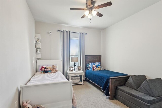 bedroom featuring carpet floors and a ceiling fan