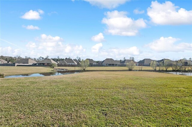 view of yard featuring a water view