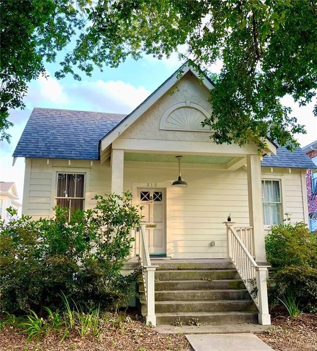 312 W Robert E Lee Blvd, New Orleans, LA 70124 - view of side of home with central air condition unit, fence, and a lawn