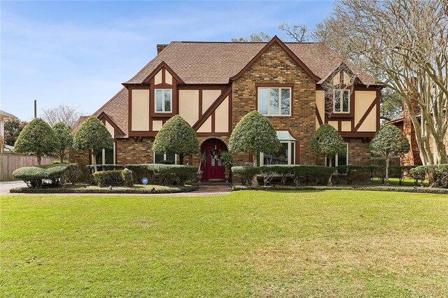 5 Five Oaks Dr, New Orleans, LA 70131 - tudor home with stucco siding and brick siding