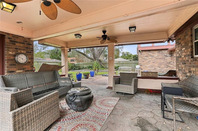 view of patio with visible vents, an outdoor hangout area, ceiling fan, and fence