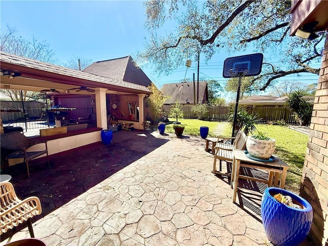 view of patio / terrace featuring ceiling fan and a fenced backyard