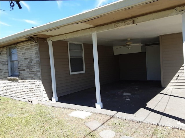 view of property exterior featuring brick siding