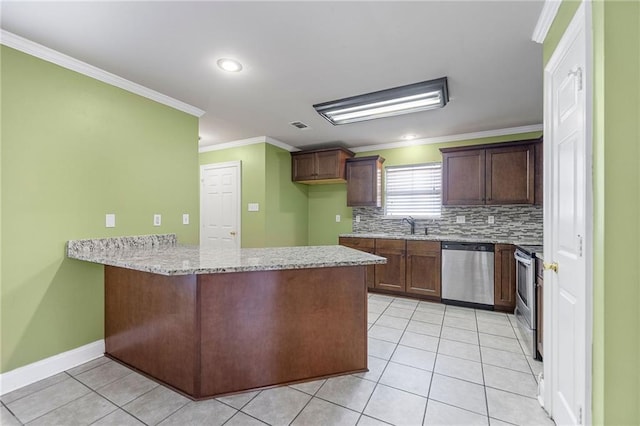 kitchen with light stone counters, light tile patterned floors, stainless steel appliances, ornamental molding, and a peninsula