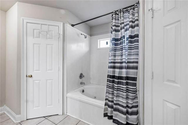 full bathroom with shower / tub combo and tile patterned floors