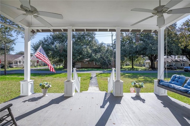 view of patio with a ceiling fan and a wooden deck