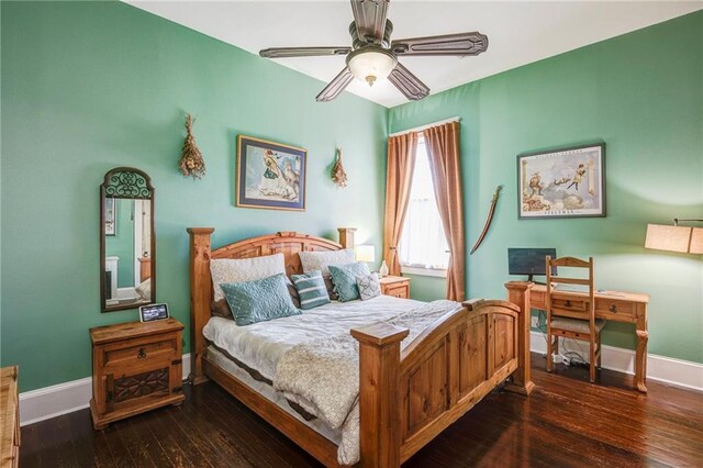 bedroom with ceiling fan, hardwood / wood-style floors, and baseboards