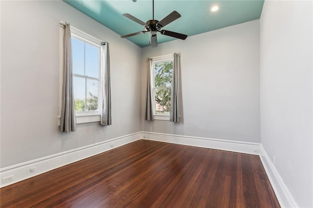 unfurnished room featuring dark wood-style floors, ceiling fan, baseboards, and recessed lighting