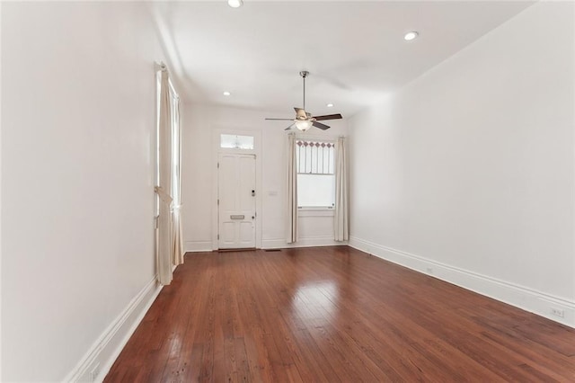 foyer entrance featuring dark wood-style floors, ceiling fan, baseboards, and recessed lighting