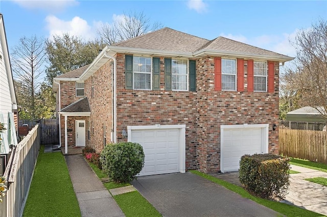 view of front of home with aphalt driveway, an attached garage, brick siding, a shingled roof, and fence