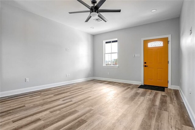 7909 Tarpon St, New Orleans, LA 70126 - entrance foyer featuring ceiling fan, wood finished floors, and baseboards