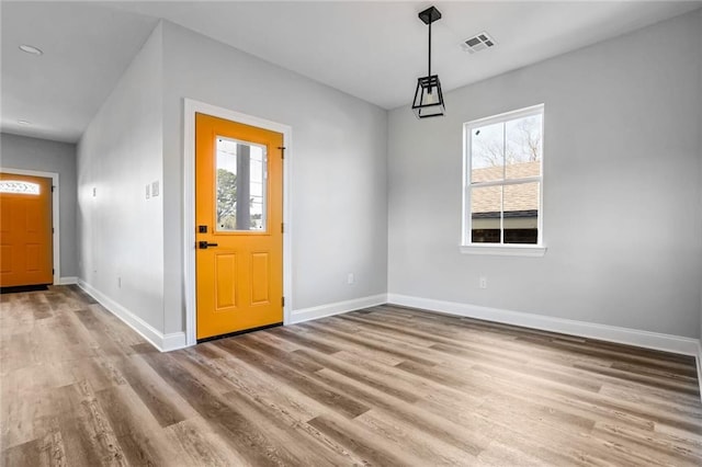 7909 Tarpon St, New Orleans, LA 70126 - entrance foyer with wood finished floors and baseboards