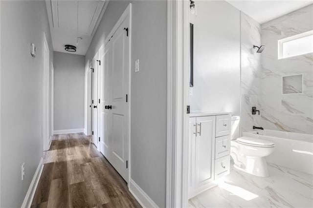 7909 Tarpon St, New Orleans, LA 70126 - corridor with attic access and baseboards