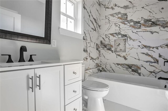 7909 Tarpon St, New Orleans, LA 70126 - bathroom featuring toilet, vanity, and shower / bathtub combination