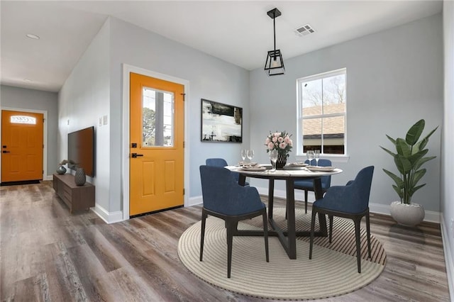 7909 Tarpon St, New Orleans, LA 70126 - dining space featuring wood finished floors and baseboards