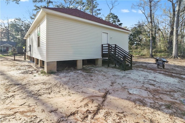view of property exterior with central air condition unit
