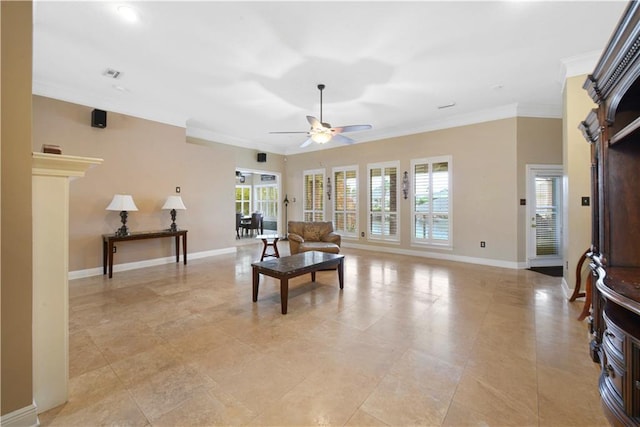 living area featuring visible vents, baseboards, ceiling fan, and crown molding