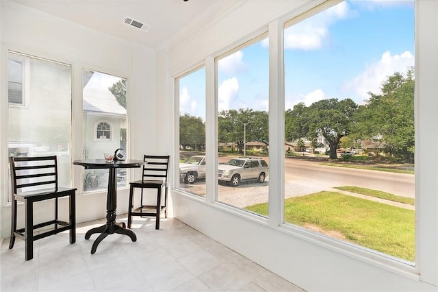 sunroom / solarium with visible vents