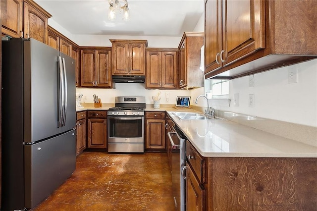 kitchen with under cabinet range hood, stainless steel appliances, a sink, light countertops, and brown cabinets