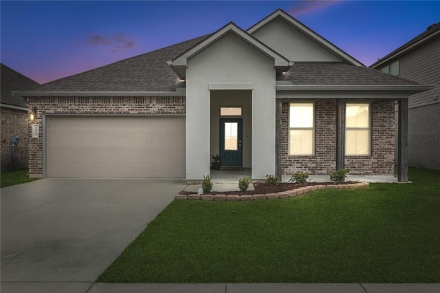 5635 Oak Trace Dr, Saint Gabriel, LA 70776 - view of front of house with brick siding, concrete driveway, and a garage