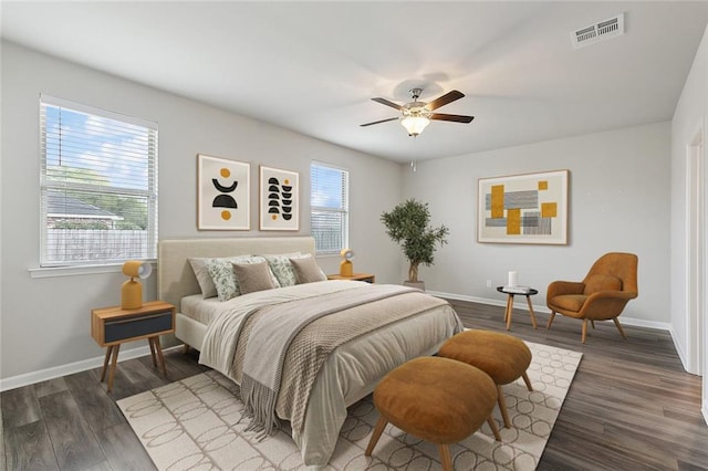 5635 Oak Trace Dr, Saint Gabriel, LA 70776 - bedroom with baseboards, wood finished floors, and ceiling fan